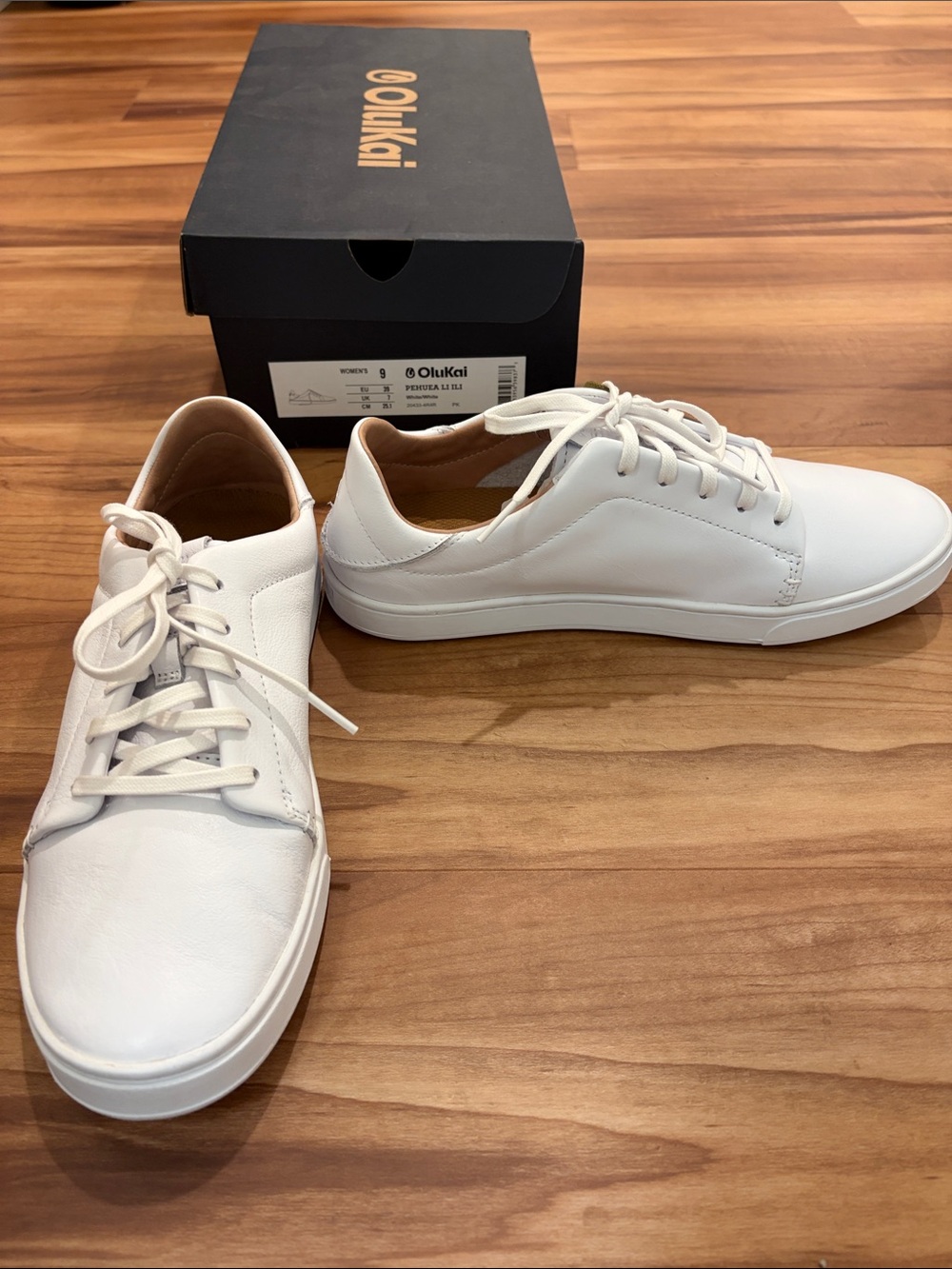 OluKai Women's White Leather Low-Top Sneakers - Picture 2 of 3